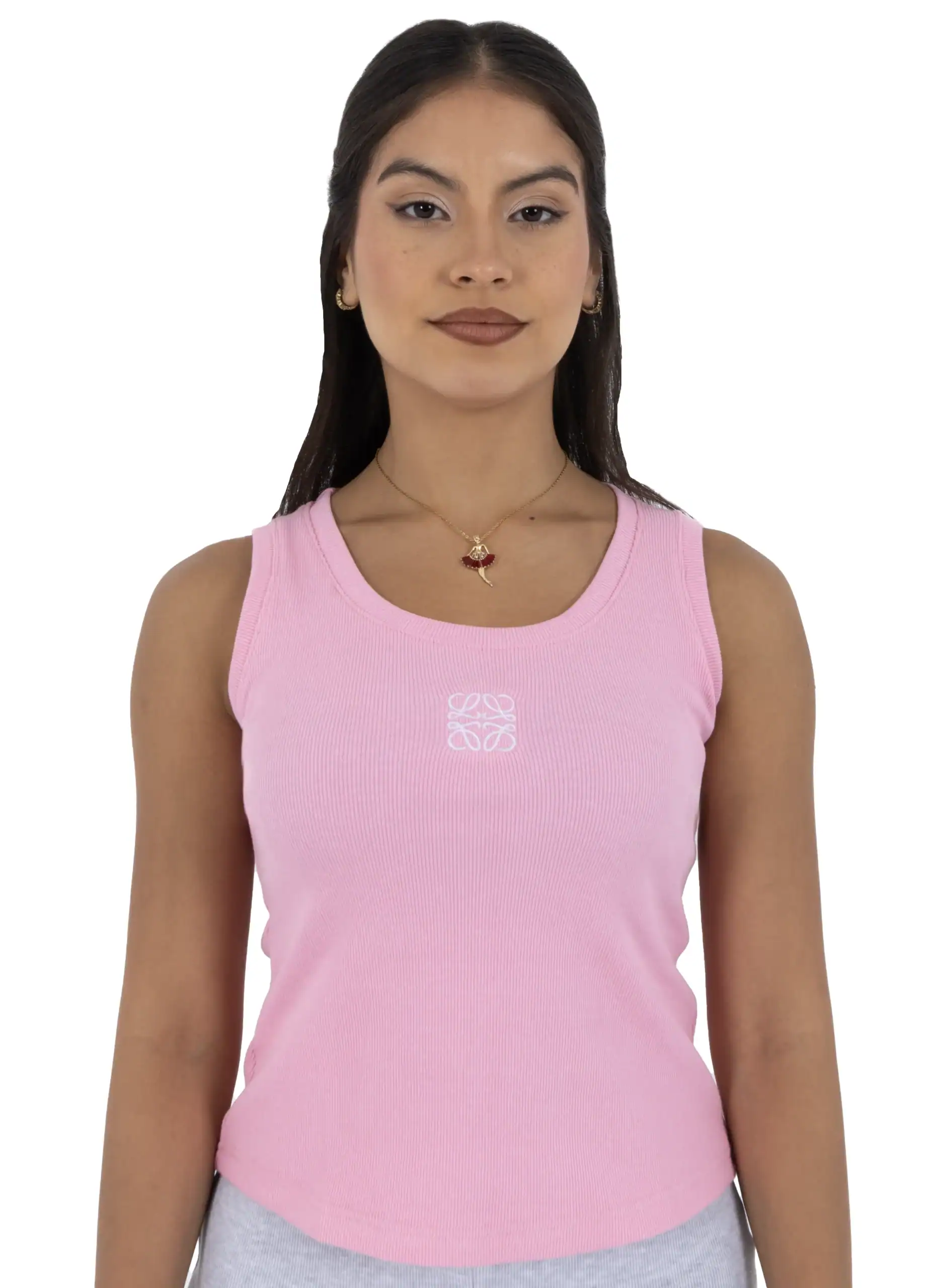 Young woman wearing a pink Loewe tank top with logo detail.